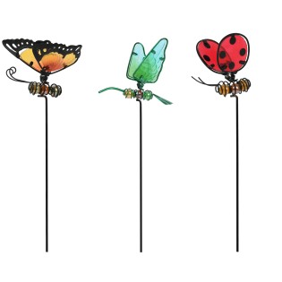 PERSONNAGE SUR PIC EN METAL ET VERRE